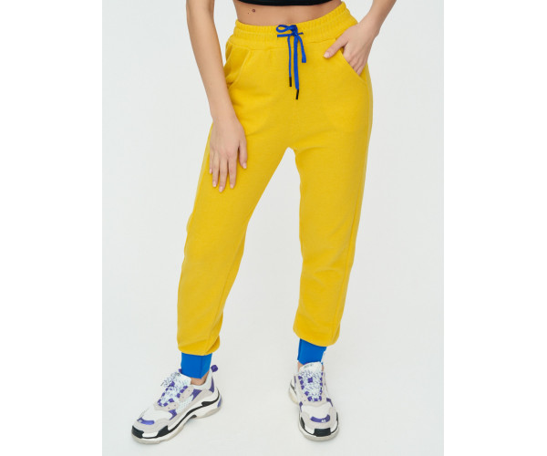 Спортивные брюки женские желтого цвета 1307J