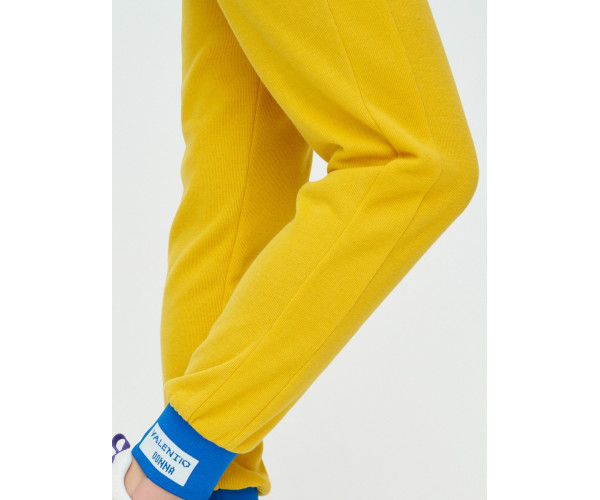 Спортивные брюки женские желтого цвета 1307J