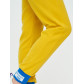 Спортивные брюки женские желтого цвета 1307J