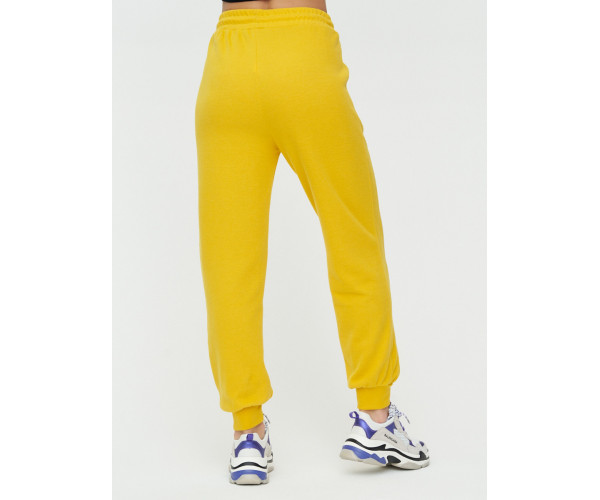 Спортивные брюки женские желтого цвета 1306J