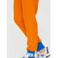 Спортивные брюки женские оранжевого цвета 1307O