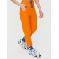 Спортивные брюки женские оранжевого цвета 1307O
