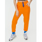 Спортивные брюки женские оранжевого цвета 1307O