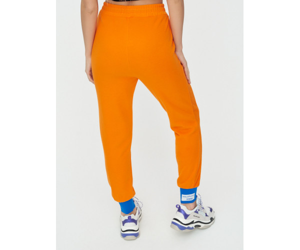 Спортивные брюки женские оранжевого цвета 1307O