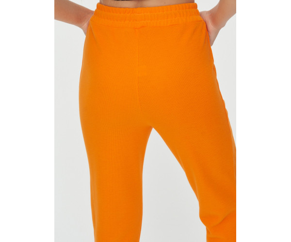 Спортивные брюки женские оранжевого цвета 1307O