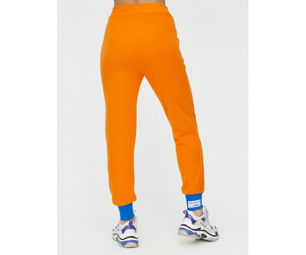 Спортивные брюки женские оранжевого цвета 1307O