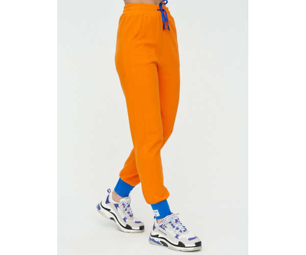 Спортивные брюки женские оранжевого цвета 1307O