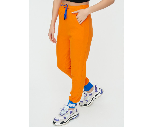 Спортивные брюки женские оранжевого цвета 1307O
