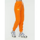 Штаны джоггеры женские оранжевого цвета 1302O