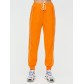 Спортивные брюки женские оранжевого цвета 1306O