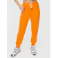 Спортивные брюки женские оранжевого цвета 1306O