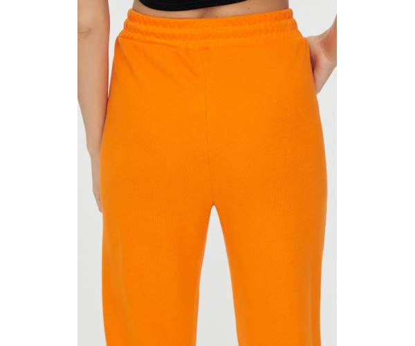 Спортивные брюки женские оранжевого цвета 1306O