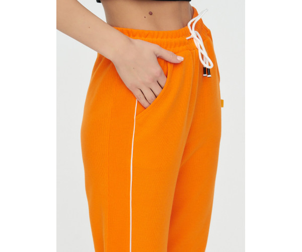 Спортивные брюки женские оранжевого цвета 1306O