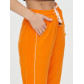 Спортивные брюки женские оранжевого цвета 1306O