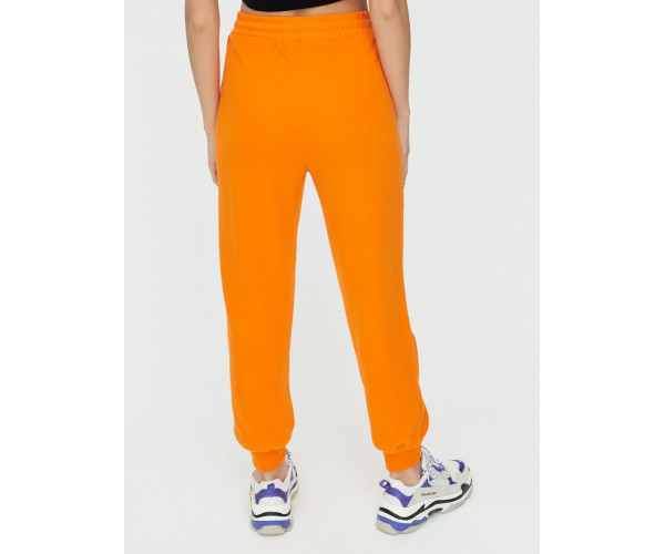 Спортивные брюки женские оранжевого цвета 1306O