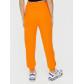 Спортивные брюки женские оранжевого цвета 1306O