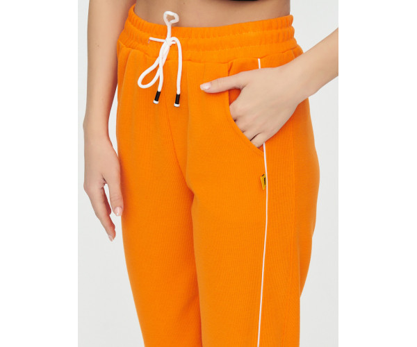 Спортивные брюки женские оранжевого цвета 1306O