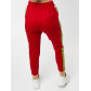 Брюки зауженные женские красного цвета 226620Kr