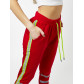 Брюки зауженные женские красного цвета 226620Kr